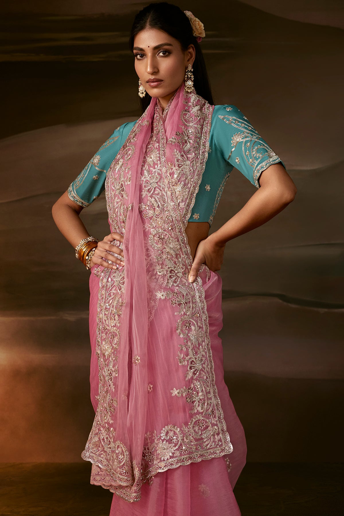 Pink Embroidered Saree with Teal Blouse