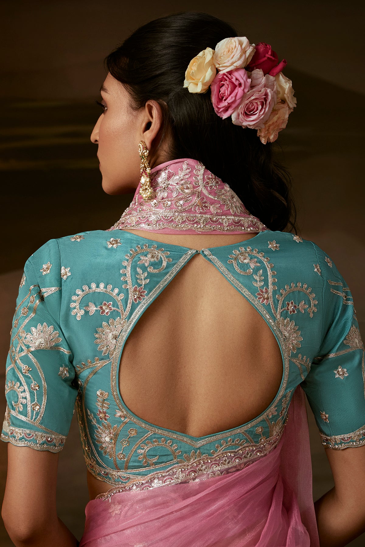 Pink Embroidered Saree with Teal Blouse