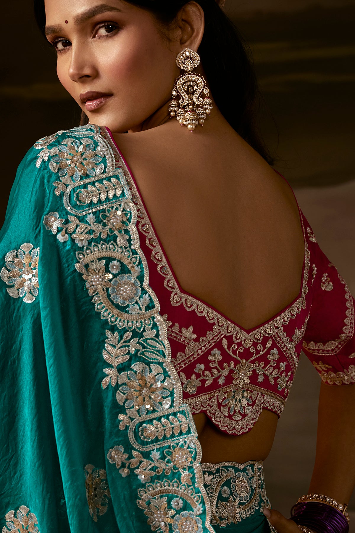 Teal Green Designer Saree with Heavy Golden Zari Embroidery