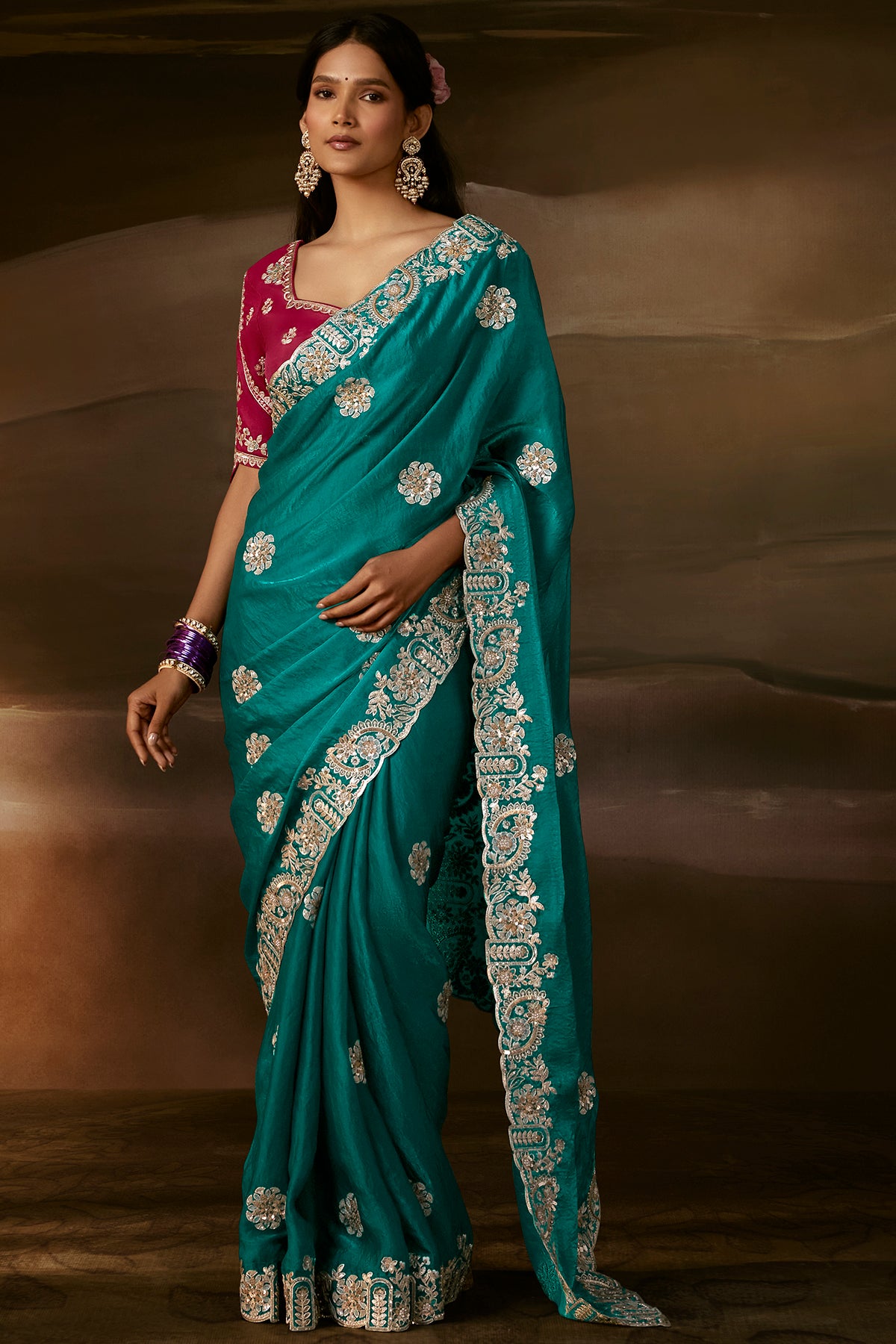 Teal Green Designer Saree with Heavy Golden Zari Embroidery